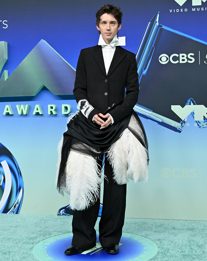 Male celebrity in avant-garde black and white suit at 22 VMAs