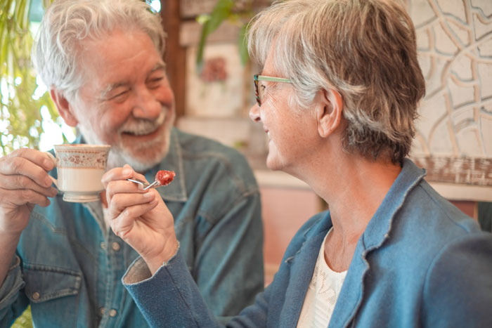A newly remarried widowed dad smiling with his new wife, highlighting a dad who remarries. A newly remarried widowed dad smiling with his new wife, highlighting a dad who remarries.