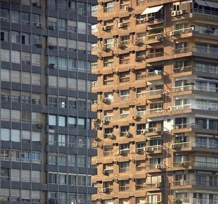 An optical illusion of two adjacent skyscrapers that look twice as confusing with matching patterns