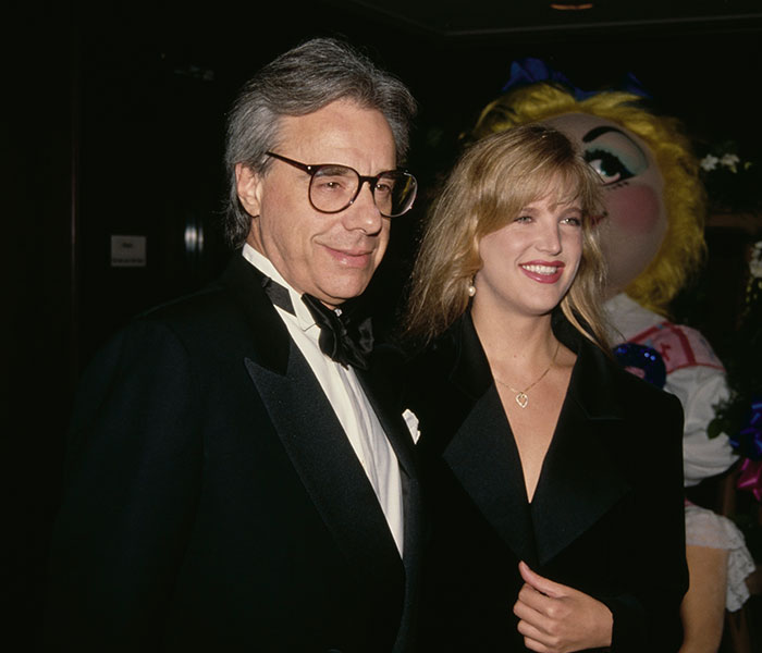 Dorothy Stratten, a beauty goddess, smiling with a man in a tuxedo, from her career in Hollywood. Dorothy Stratten, a beauty goddess, smiling with a man in a tuxedo, from her career in Hollywood.