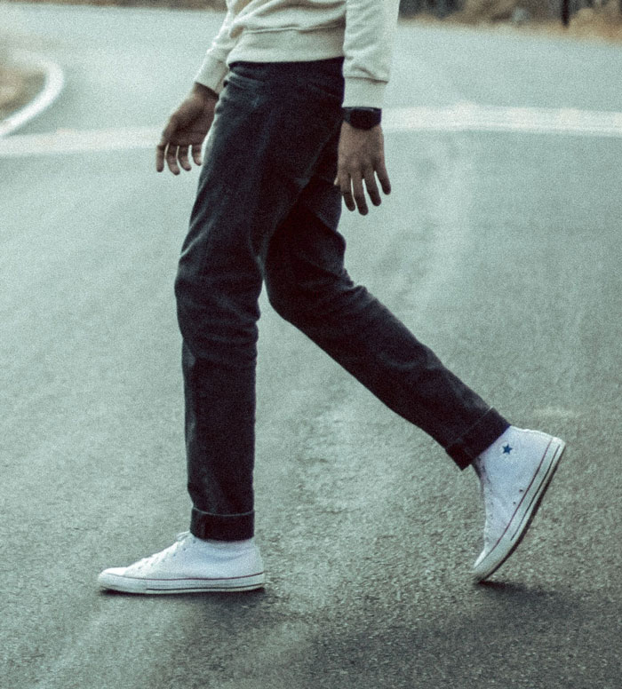 A worker walking on the road, reflecting on their job and thinking 'I'm done' with their current situation.