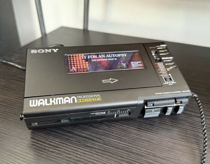 A black Sony Walkman Professional retro tech, a classic 80s device, embodying glorious weirdness.