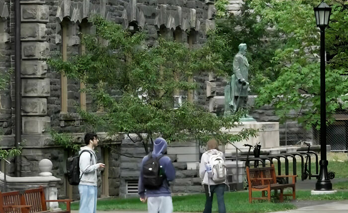 Students walking on campus grounds associated with the Cornell 7 case. Students walking on campus grounds associated with the Cornell 7 case.