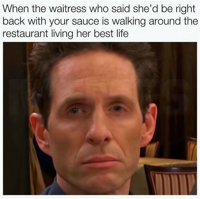 A hilarious meme showing Dennis Reynolds looking annoyed, with text about a waitress living her best life instead of bringing sauce.