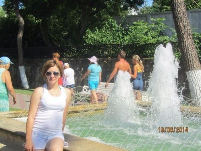 A man appears to wear a water dress from a fountain, an amazing moment synced just right with the spray.