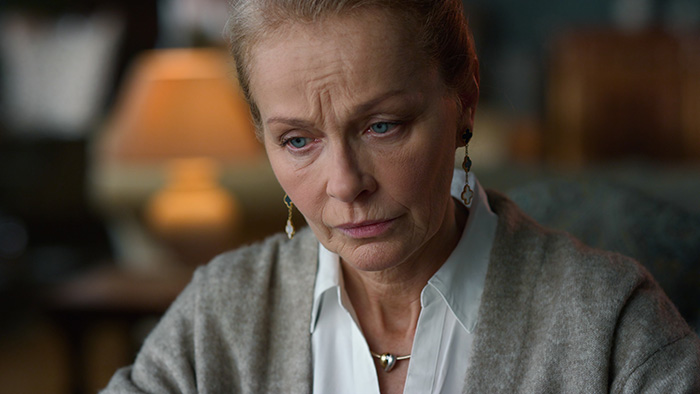 Woman looking upset, reflecting tension about son’s fiancée Woman looking upset, reflecting tension about son’s fiancée