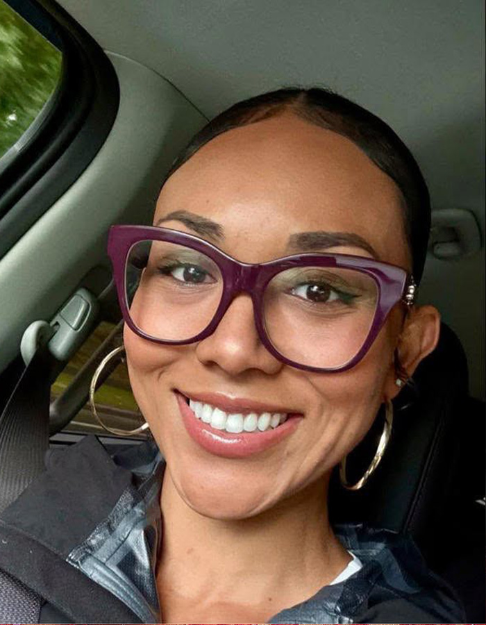 Smiling surrogate mother refusing to end pregnancy, driving in a car. Smiling surrogate mother refusing to end pregnancy, driving in a car.