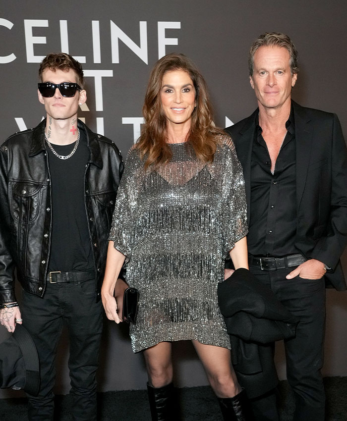 Presley Gerber posing with his parents Cindy Crawford and Rande Gerber at a Celine event. Presley Gerber posing with his parents Cindy Crawford and Rande Gerber at a Celine event.