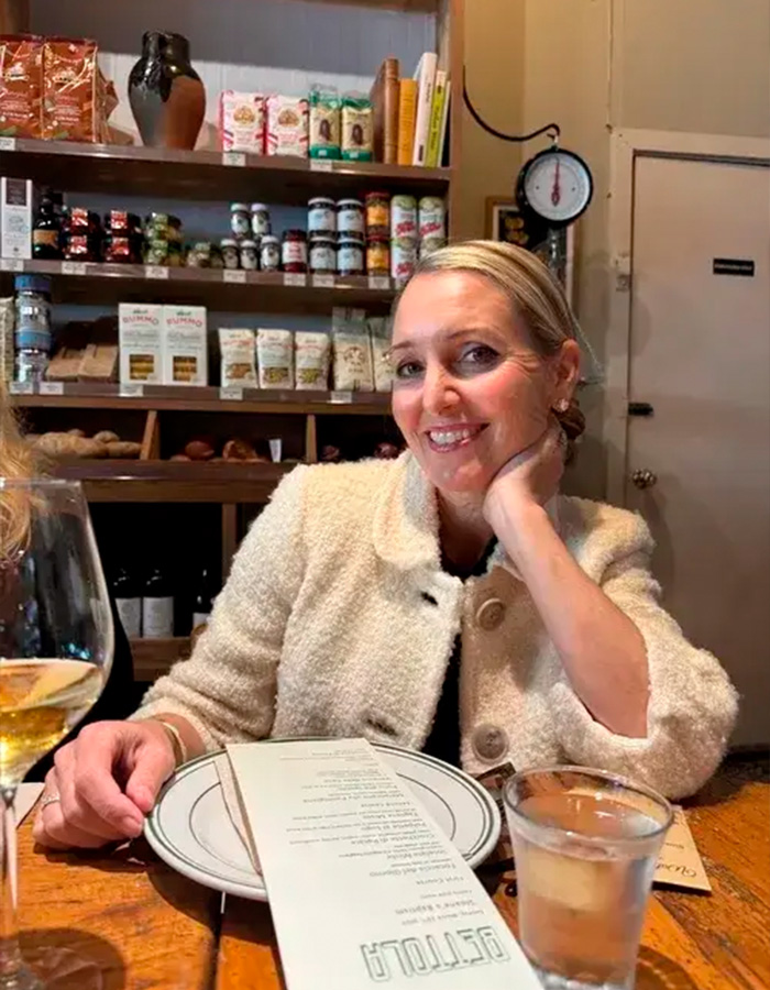 Photo of woman smiling in cafe related to wife missing six months case