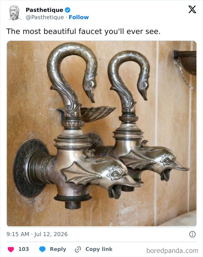 A pair of beautiful silver faucets shaped like dolphin heads in an aesthetic art design