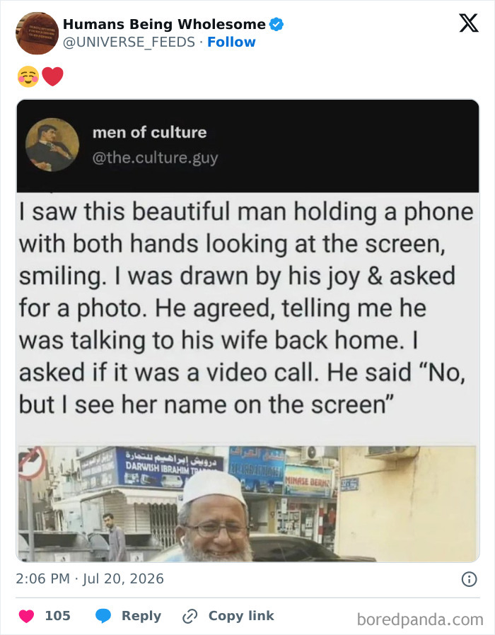 Joyful man holding phone smiling, sharing story of love and connection with his wife