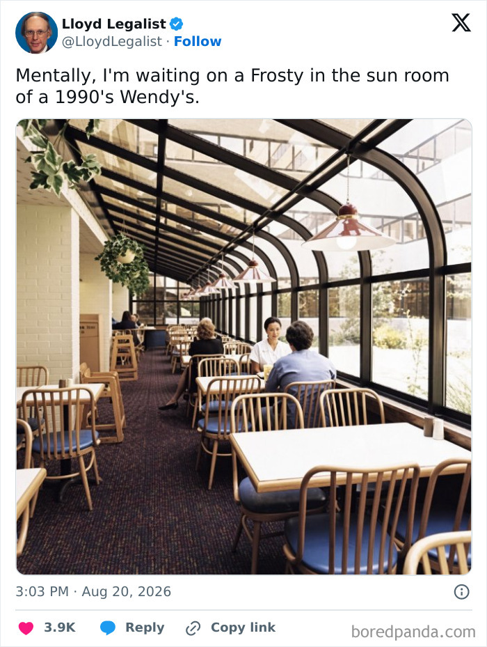 An empty sunroom of a 1990s Wendy's with tables and chairs, capturing the essence of unhinged funny tweets.