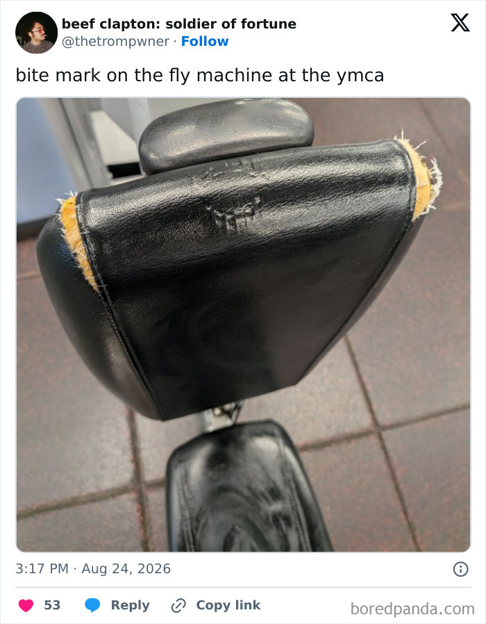 A close-up of a bite mark on a black fly machine seat at the YMCA, showcasing unhinged funny tweets.