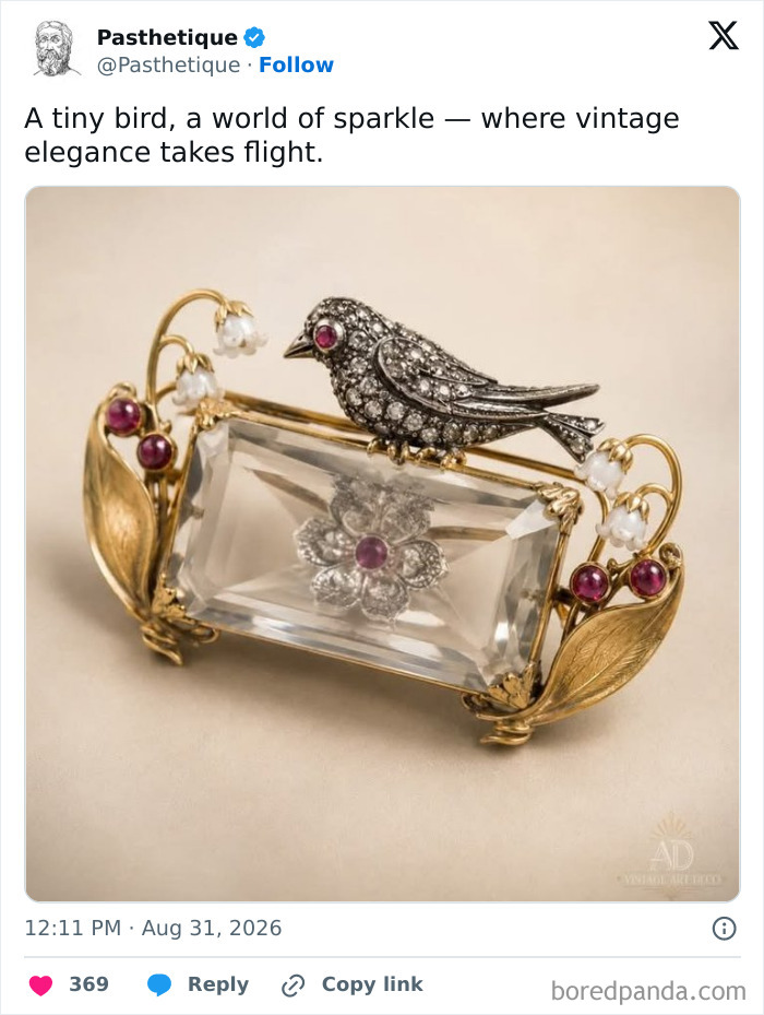 Vintage style aesthetic art bird brooch with a clear crystal and ruby accents