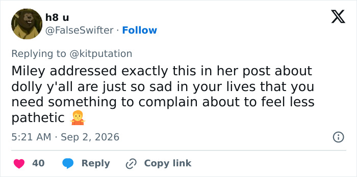 Screenshot of a tweet from h8 u defending Miley Cyrus' announcement after Dolly Parton's passing.