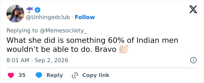 A social media post with a comment highlighting the female weightlifting medalist's impressive strength compared to many men. A social media post with a comment highlighting the female weightlifting medalist's impressive strength compared to many men.