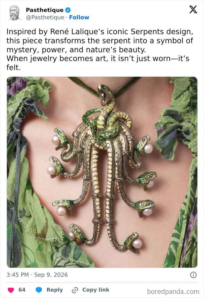 A detailed René Lalique serpent necklace, a piece of historic aesthetic art.