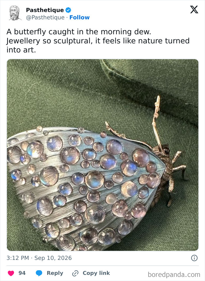 A butterfly brooch decorated with moonstones, representing aesthetic art inspired by nature.