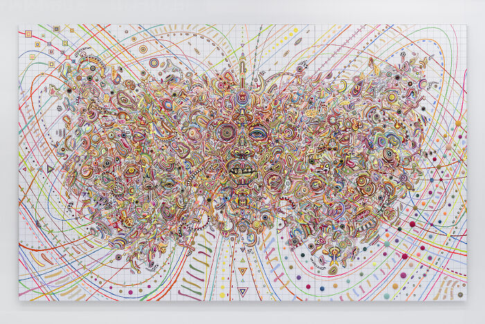 Intricate, colorful, butterfly-shaped psychedelic wall art piece from unusual sculptures.