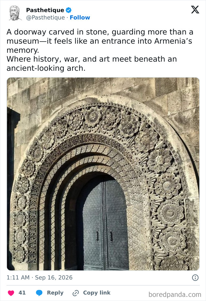 An ancient, intricately carved stone doorway displaying historical architecture and culture.