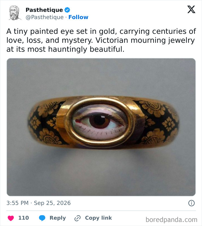 A gold ring featuring a detailed painted eye, representing aesthetic art and history.