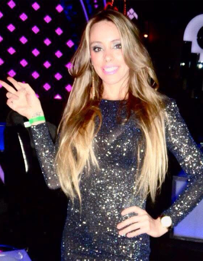Woman posing in a sparkly dress, highlighting the story of her cosmetic procedures and tragic loss of life. Woman posing in a sparkly dress, highlighting the story of her cosmetic procedures and tragic loss of life.