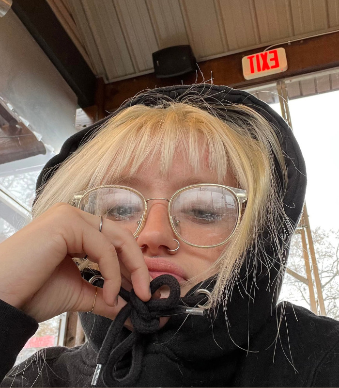 Close-up of a woman rejecting a man, with blonde hair and glasses, used to raise awareness. Close-up of a woman rejecting a man, with blonde hair and glasses, used to raise awareness.