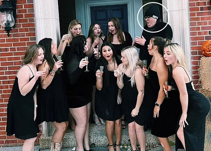 Sorority sisters gather for a photo with a circled individual in the back.