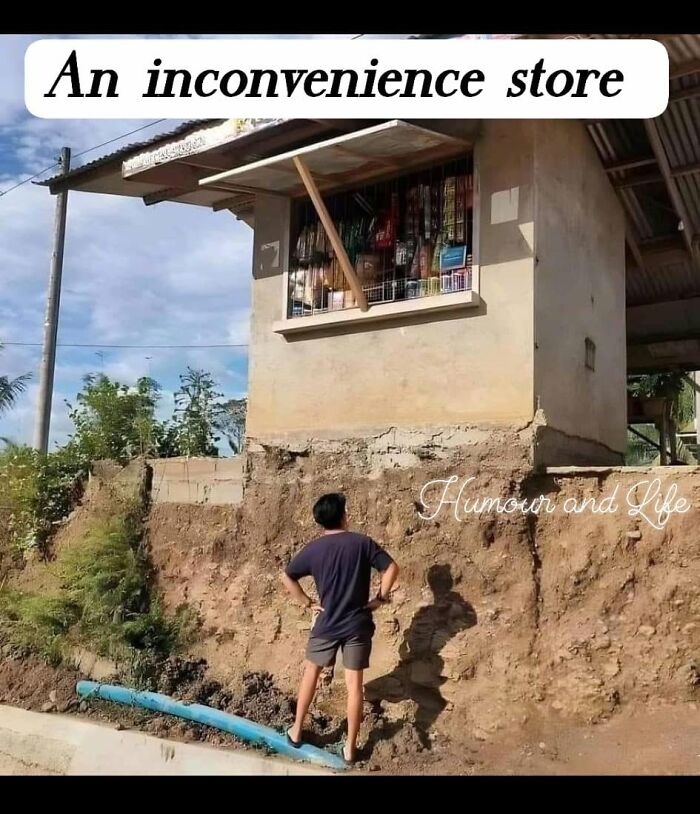 Humorous photo of a man looking at an inconveniently placed store on a hill
