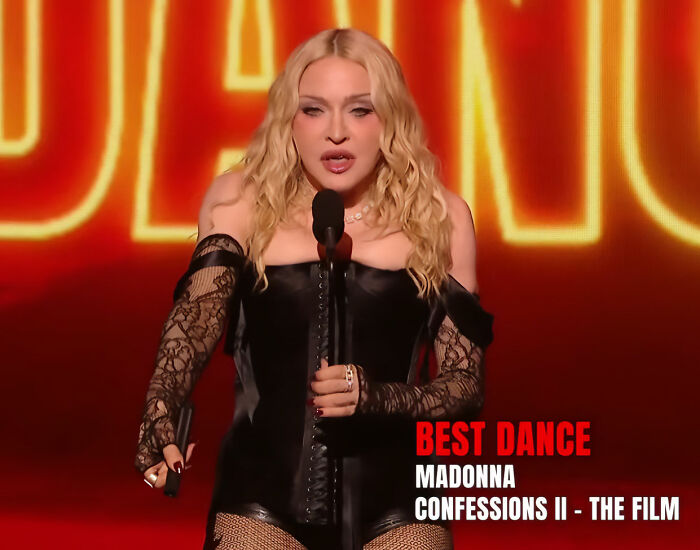 Madonna performing in black corset and lace gloves at VMAs highlighted for best dance award Madonna performing in black corset and lace gloves at VMAs highlighted for best dance award