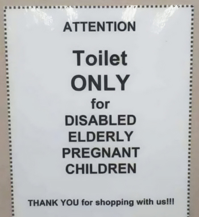 A funny sign about a toilet ONLY for DISABLED ELDERLY PREGNANT CHILDREN, creating a silly funny sign.