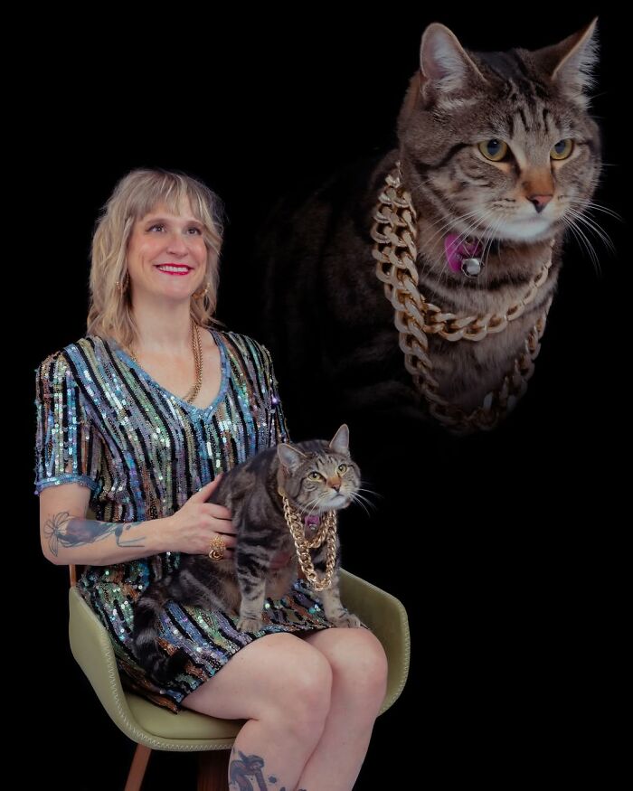 Quirky portraits of pets and their owners: a woman in a sparkly dress with her tabby cat wearing a gold chain.