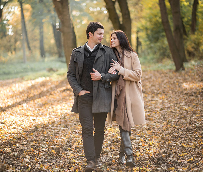 Mother and new husband walking in a park, sparks outrage for leaving children to pursue IVF. Mother and new husband walking in a park, sparks outrage for leaving children to pursue IVF.