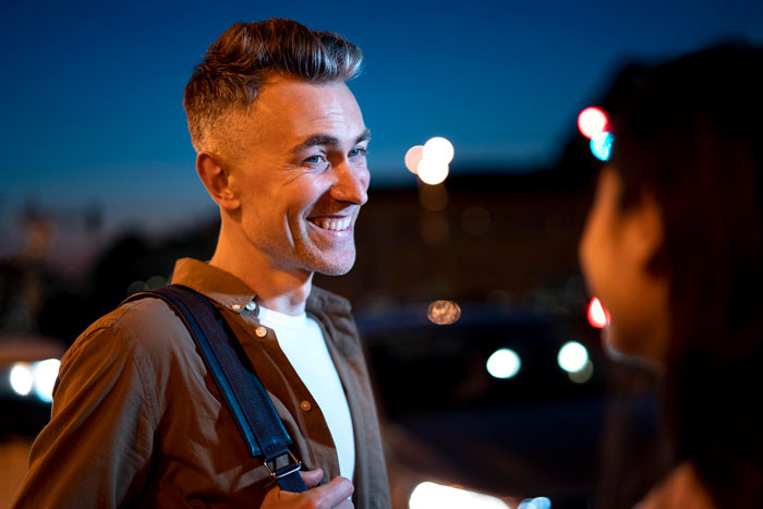 A happy man, hinting at a hubby flirting, which could lead to a marriage breaking point.