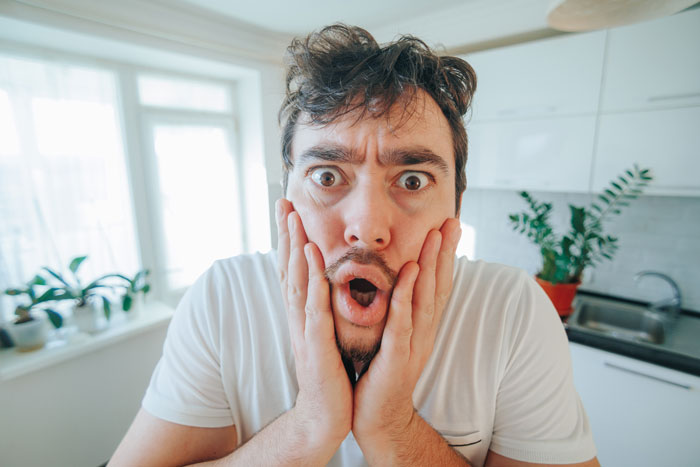 A shocked man expressing dismay, representing a fed up neighbor reacting to loud parties by students turning their home into a bar. A shocked man expressing dismay, representing a fed up neighbor reacting to loud parties by students turning their home into a bar.
