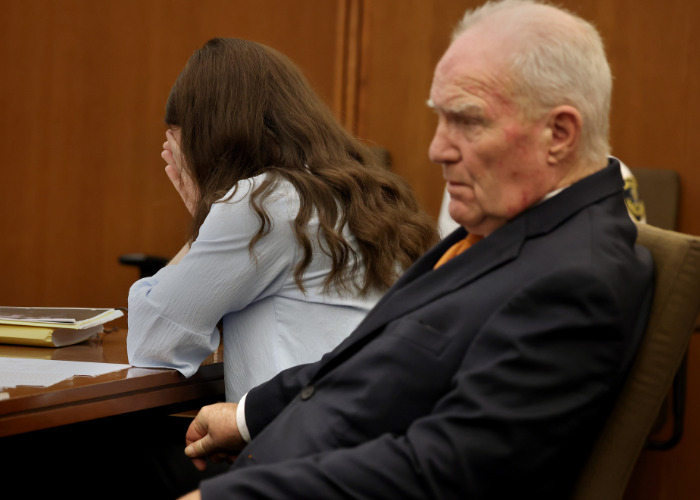 Lindsay Clancy in court, with an older man beside her, during the trial that resulted in a mistrial. Lindsay Clancy in court, with an older man beside her, during the trial that resulted in a mistrial.
