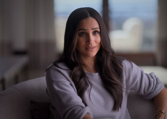 Meghan looks directly at the camera, discussing the context of King Charles' letter to Harry and her as private citizens. Meghan looks directly at the camera, discussing the context of King Charles' letter to Harry and her as private citizens.