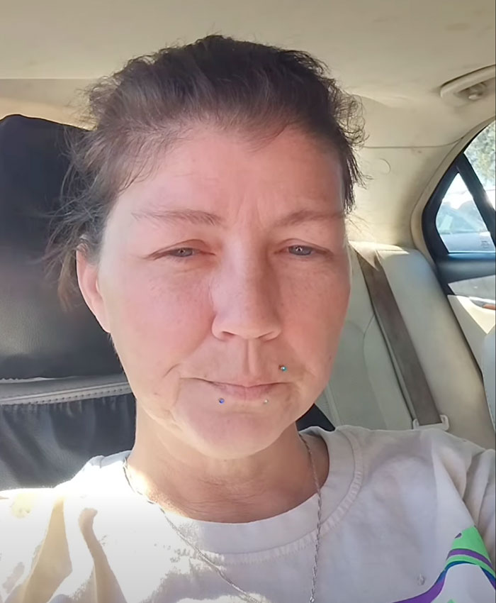 Close-up of a woman's face, likely the mom charged in the mom and son charged case.