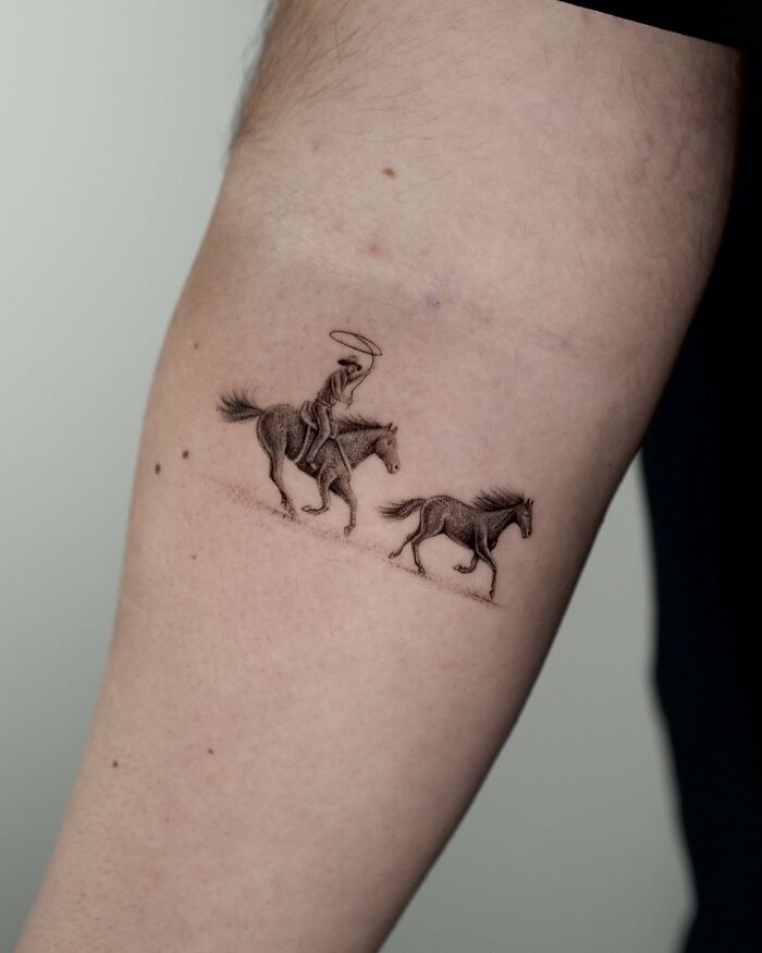 Tattoo of a cowboy riding a horse and a running horse animal tattoo