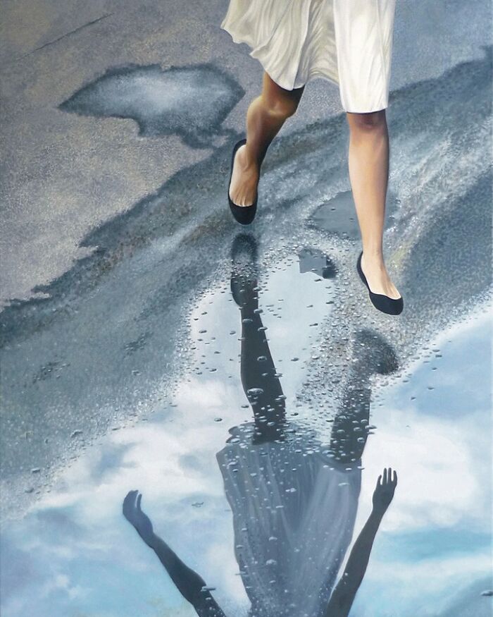 A painting of a woman walking by a puddle with a reflection.