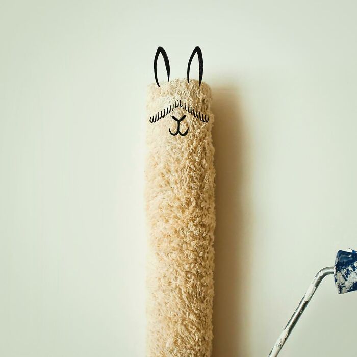 An illustration of a paint roller transformed into a llama, demonstrating everyday objects coming to life.