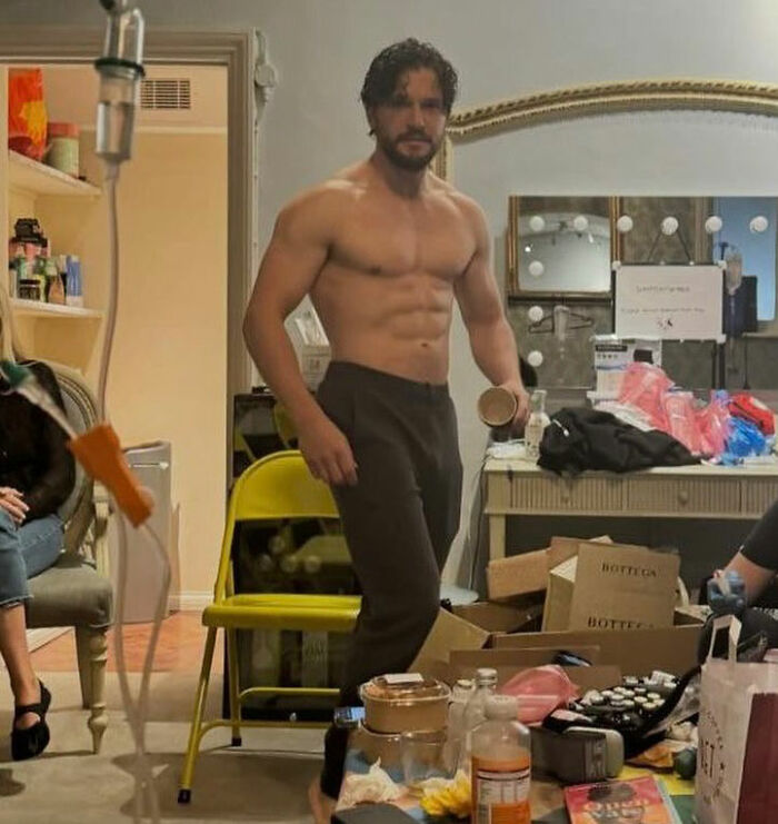 Shirtless Game Of Thrones star showing muscular physique indoors