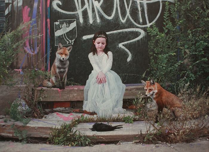 A girl in a white dress sits near two foxes in one of the dystopian paintings by Kevin Peterson