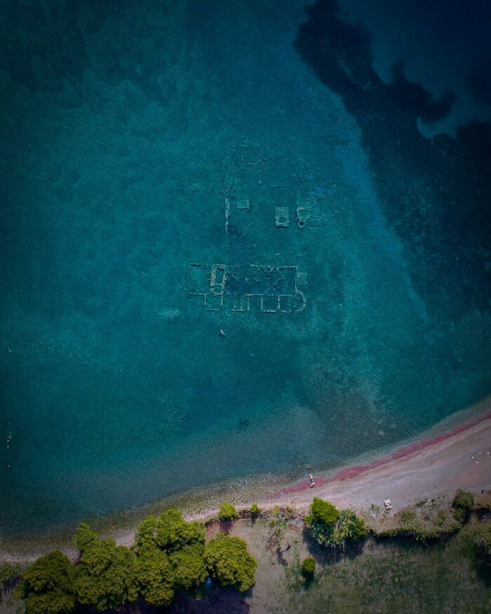 Aerial view of sunken ruins showing ancient structures discovered at the bottom of the ocean