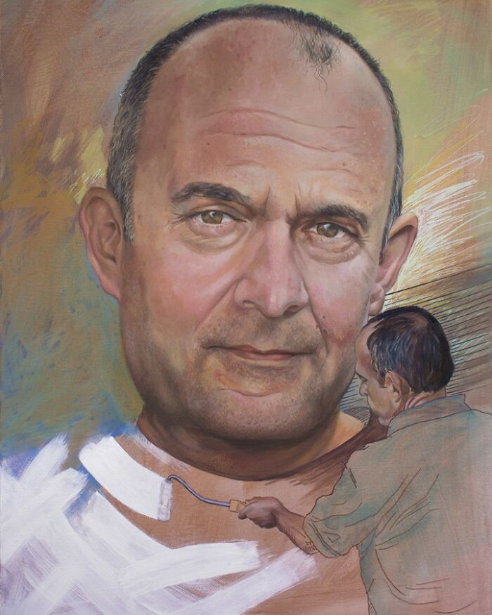 A painting of a man painting another giant face by Michel Devanakis.