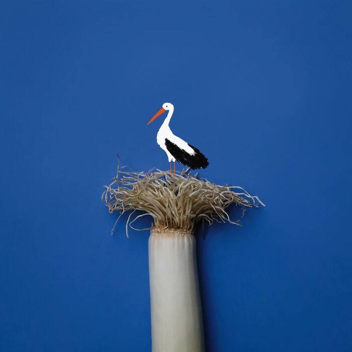 A playful illustration of a stork nesting on a leek, showing everyday objects coming to life.