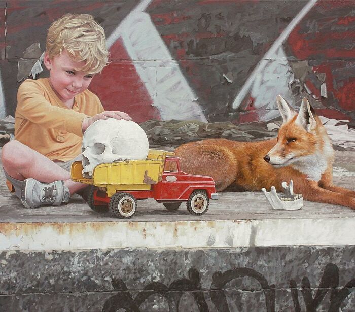 A young boy playing with a toy truck and a skull next to a red fox in dystopian paintings by Kevin Peterson.
