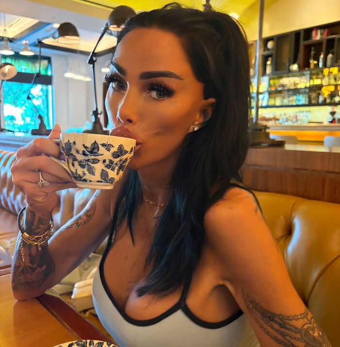 Katie Price's latest appearance after corrective surgery, sipping a drink, sparks concern. Katie Price's latest appearance after corrective surgery, sipping a drink, sparks concern.
