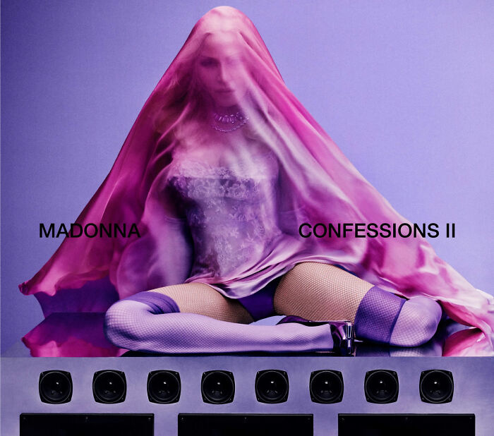 Promo graphic featuring Madonna representing her music and style for VMAs performance context. Promo graphic featuring Madonna representing her music and style for VMAs performance context.