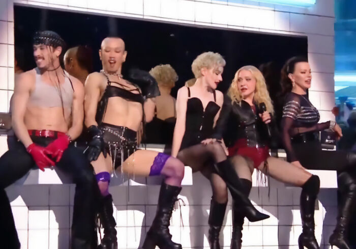 Madonna and dancers during VMAs performance on stage Madonna and dancers during VMAs performance on stage